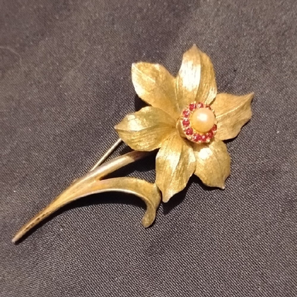Marcel Boucher Elegant Gold Flower Brooch with Red Accents